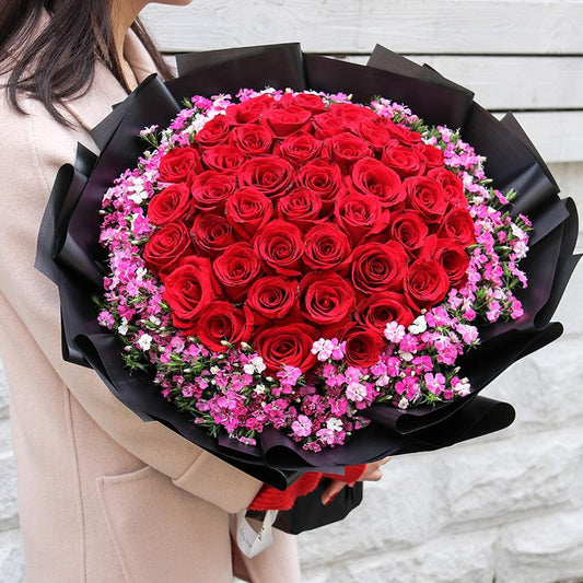 Tenderness(33 red roses with plump pink dianth)