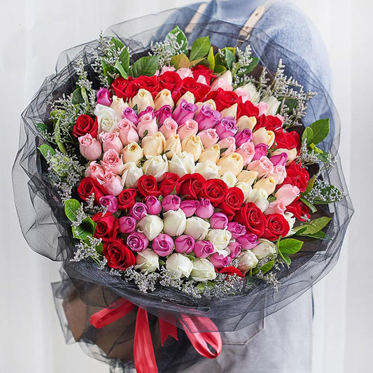 Rainbow love words(
99 mixed color roses (red + white + champagne + purple))