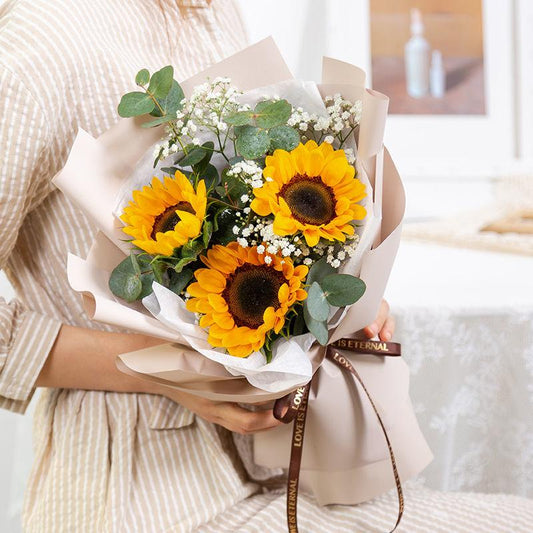 Positive belief(3 sunflowers with white gypsophila )